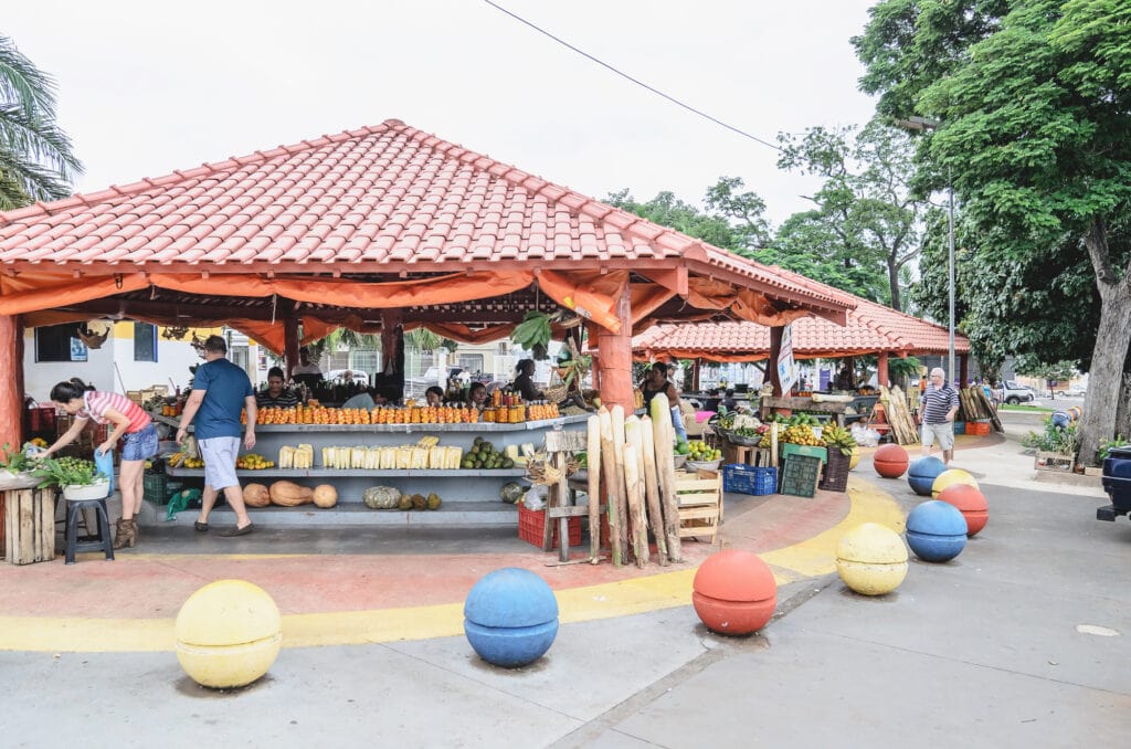 Campo Grande, Brazil - February 24, 2018: Square that has some indigenous people selling fresh foods. Square named Praca Comendador Oshiro Takemori, beside the Mercadao Municipal.