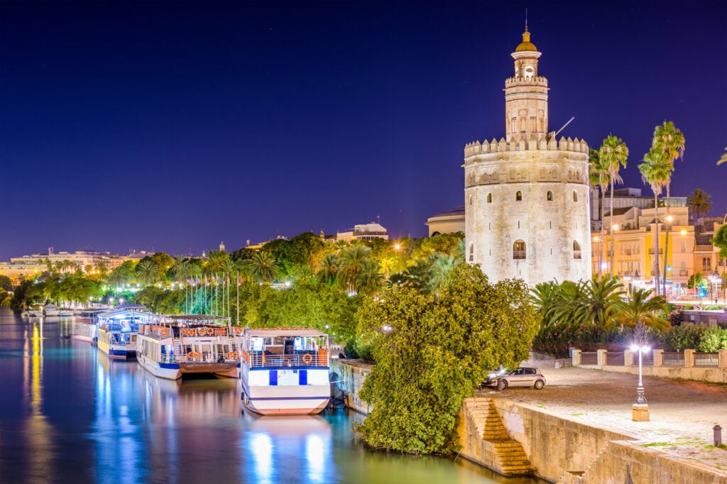 Seville, Spain at the Torro de Oro on the Guadalquivir River.