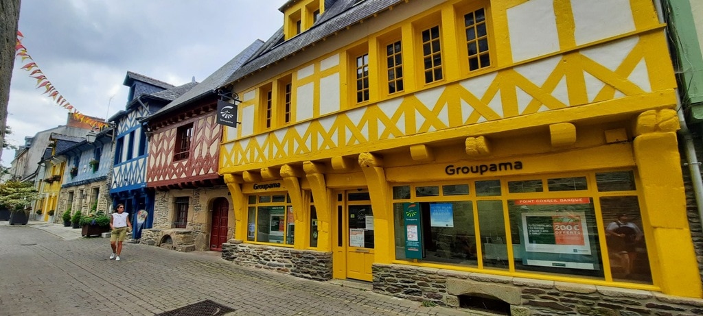 Château de Josselin the colourful half-timbered buildings of Josselin that are across from the Basilica Notre Dame.