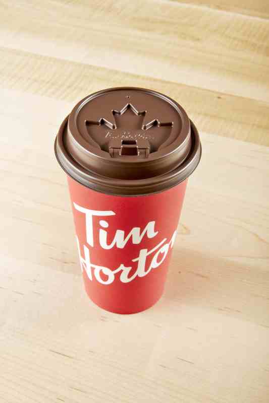 The new Tim Hortons lids have been completely redesigned in both function and design with a raised dome, tabbed closure, an improved flow of coffee and an embossed maple leaf.
