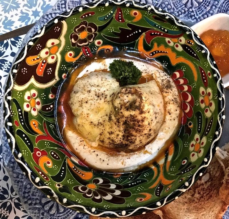 a dish of Çılbır food travel