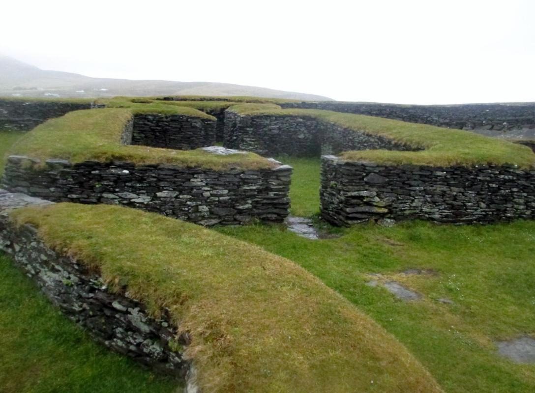 Leacanabuile ring fort a circular ring of stones in a grass mound