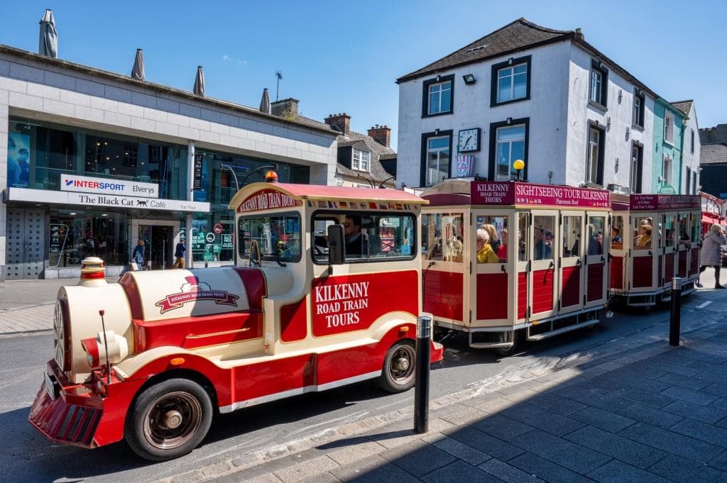 The little red road Train that takes tourists around Kilkenny City