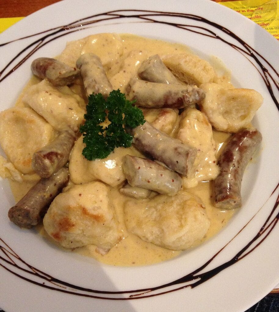  Luxembourgish Dumplings (Kniddelen) are made of white flour and water and often served with bacon (lardons) and gravy.