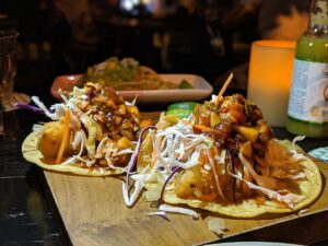 Corn Tortillas stuffed with shredded meat and cheese