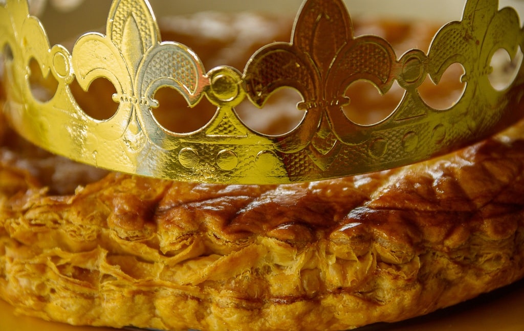 The ‘king’s cake’ celebrates Epiphany in France. There are several versions of the cake and most can be found in grocery stores wearing a glittering crown of paper.