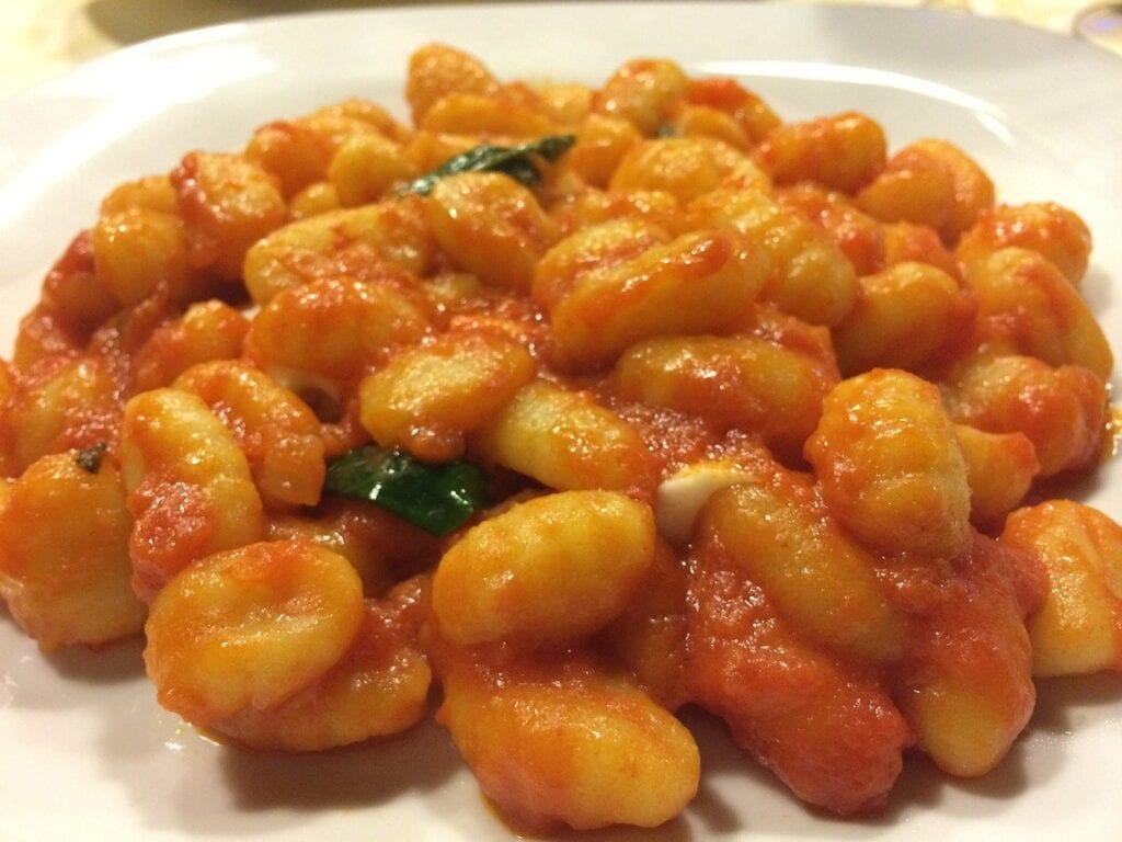 Gnocchi recipes are essentially a combination of flour and potato combined to make the dough. This mixture is then rolled out and cut into bite-sized pieces. The fluffy pillows or dumplings are then shaped to ensure they capture the delicious sauce they are served in the best way possible 