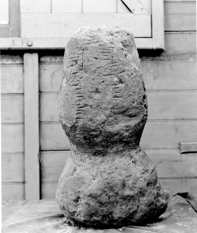 a small, battered column, about 60cm tall. Washing the stone revealed markings which were identified as an ‘inscription written in Ogham characters’. It remains the most easterly find of an Ogham stone to date.