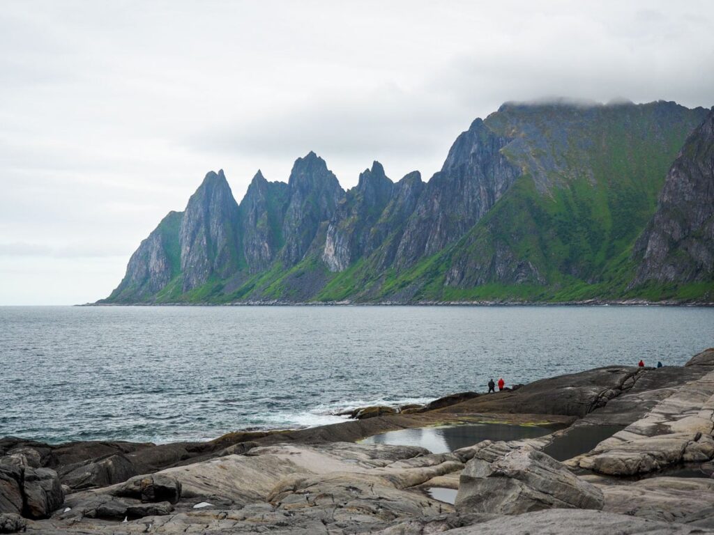 Senja National Tourist Route, stopping at stunning viewpoints like Tungeneset and Bergsbotn, enjoying Arctic beaches like Ersfjord Beach, and seeing fishing towns like Husøy and Gryllefjord. 