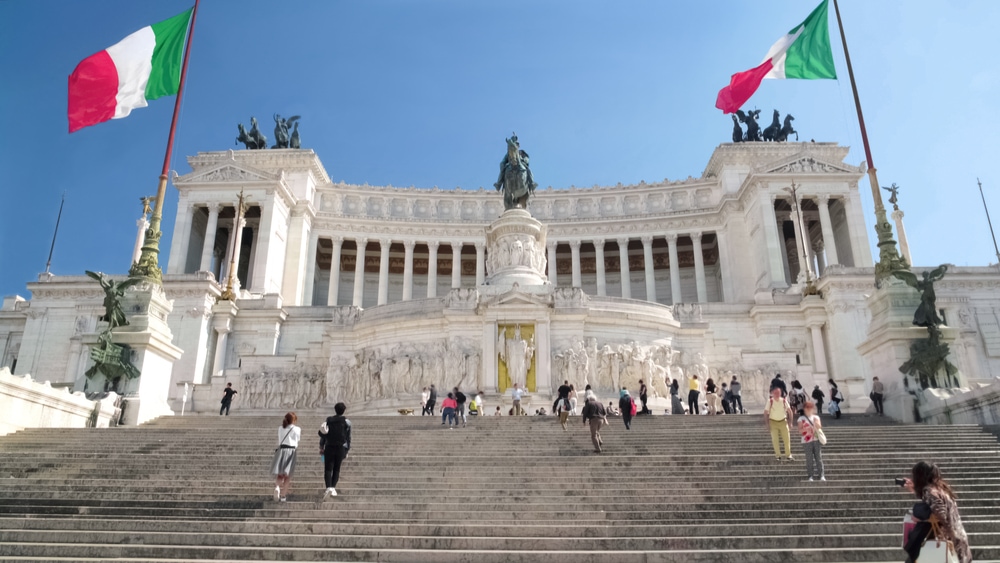 Beautiful Il Vittoriano monument in Rome, many tourists in Italy, sightseeing