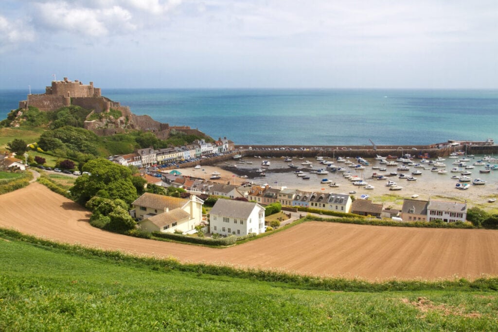 View to Mont Orgueil Castle with harbour in Gorey, Jersey, UK