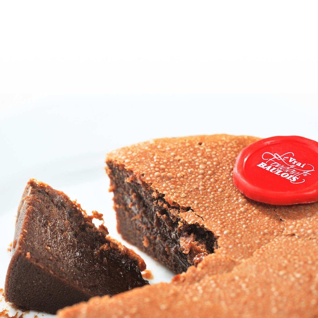Baulois Cake a round almost chocolate looking cake