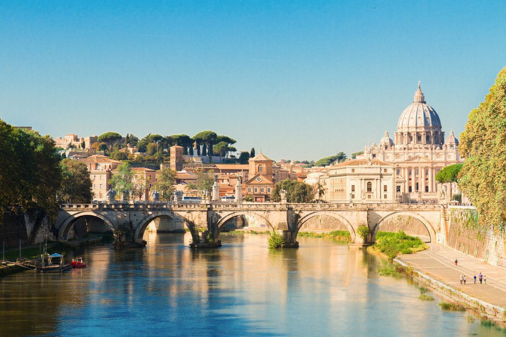 St. Peter's cathedral over bridge and river in Rome, Italy