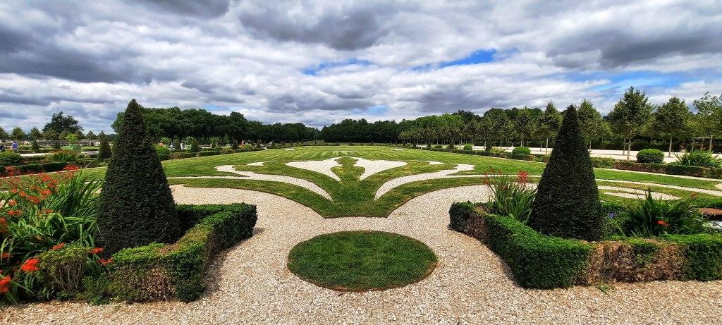 Gardens at Chambord with a fleur de lis design crafted into the lawns