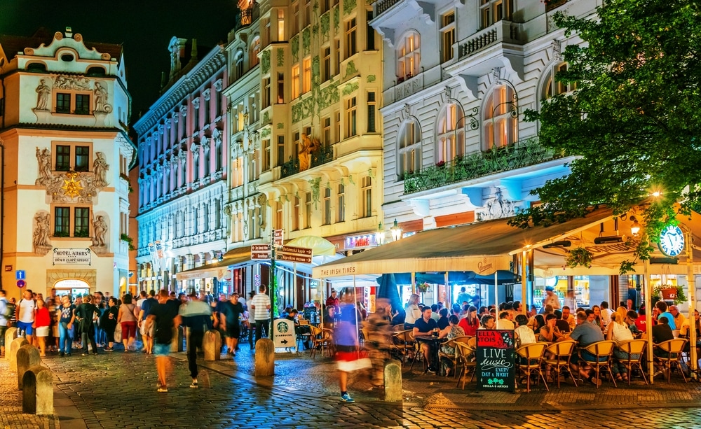 food in Prague, restaruants and cafes in Prague's old town PRAGUE, CZECH REP - AUG 2, 2019: Night view of Karlova Street in downtown Prague, Czech Republic
