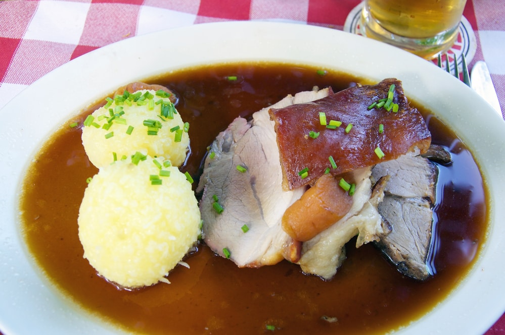 ROast pork with potato dumplings is a popular dish in Bavaria, especially in a beer garden.