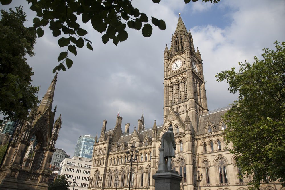 Albert Memorial by Noble (1867) and Town Hall, Albert Square, Manchester, England in Black and White Sepia Tone