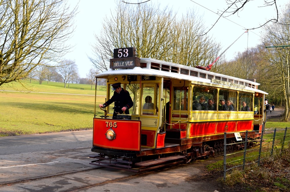 Prestwich, Manchester, England, UK - March 13, 2016 : Tram number 765 being driven in Heaton Park.