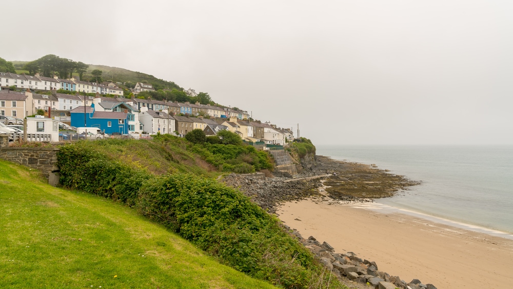 New Quay, Ceredigion, Dyfed, Wales, UK  Morning dust over the beach and the village