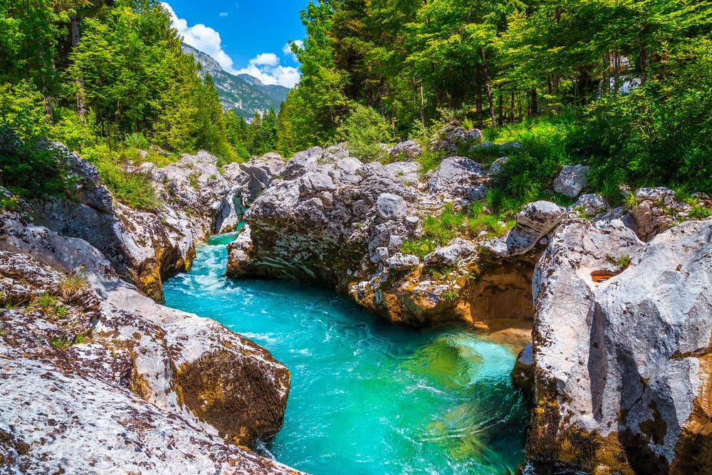 Popular rafting and kayaking place in Europe. Well known recreation place and kayaking destination. Amazing turquoise Soca river and gorge, Bovec, Slovenia, Europe