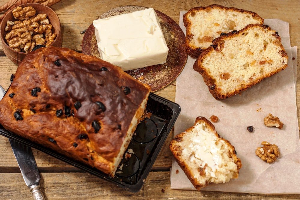 Barmbrack or bairin breac is a traditional Irish sweet yeast bread with grapes and raisins, often eaten with afternoon tea butter and traditionally served on Halloween