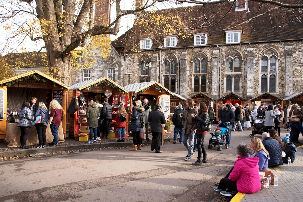 first weekend of the annual Christmas Market at Winchester Cathedral Hampshire England UK 