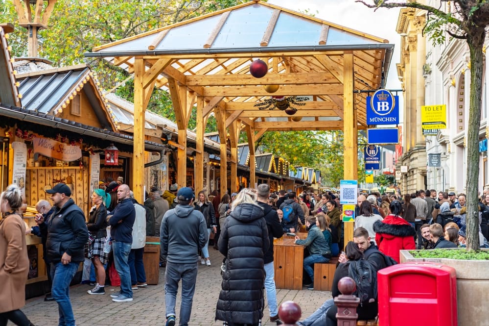 Manchester, England - 13 November 2021: Extremely busy crowds during Christmas Market 2021 openings in Manchester, UK 