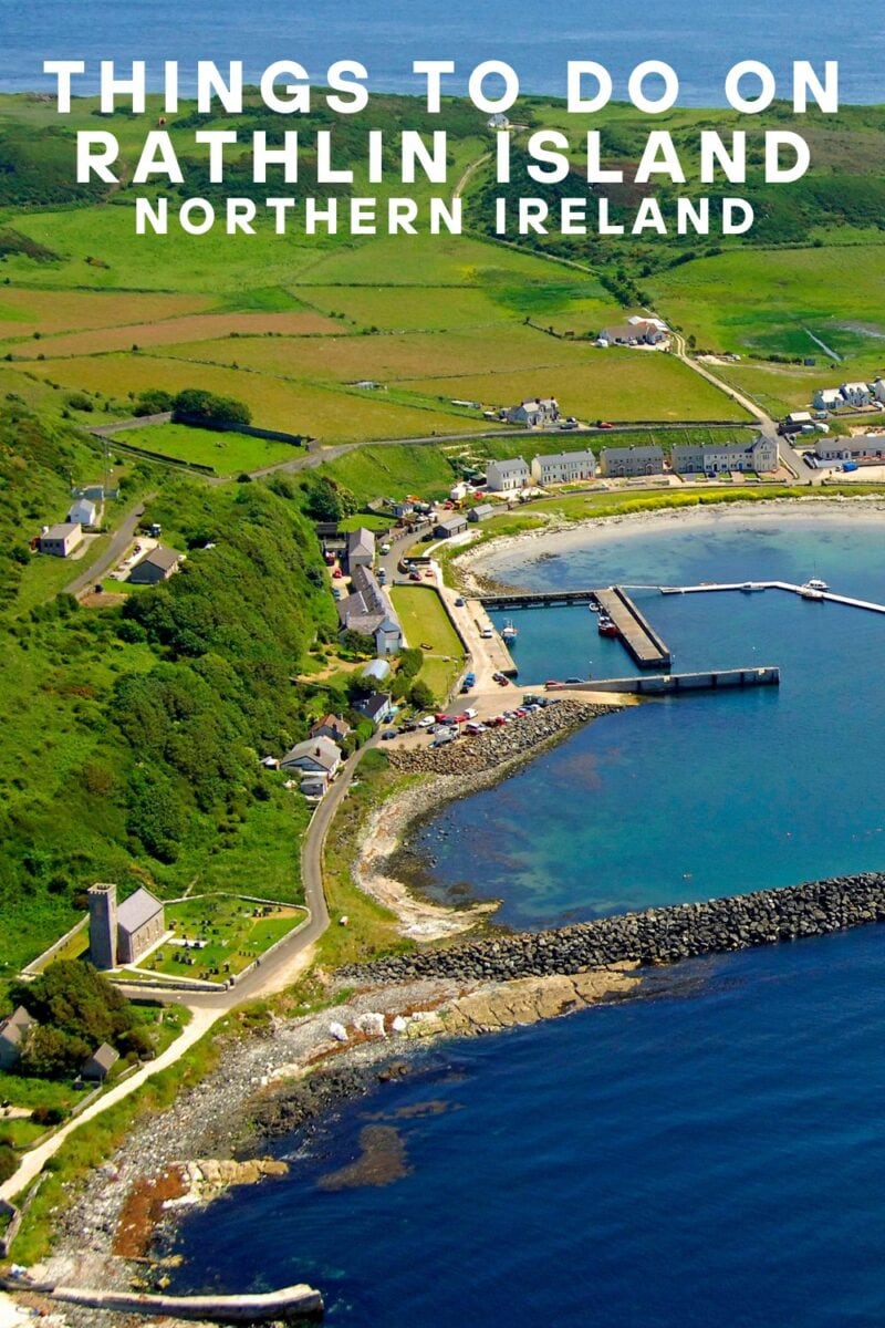 Aerial view of Rathlin Island, Northern Ireland, showcasing its green landscape, coastline, and small harbor. Text on image reads "Things to do on Rathlin Island, Northern Ireland.