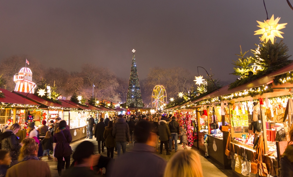 LONDON, ENGLAND - December 18, 2016: People walking in the Christmas markt of the Hyde Park's winter WonderLand park. The park 10th edition includes shows, live bands, markets and attractions.