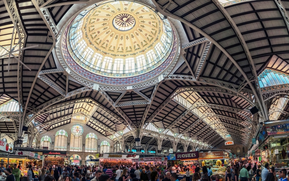 View of crowded Central Market interiors. It is considered one of the oldest European markets still running, most vendors sell food items. Beautiful design