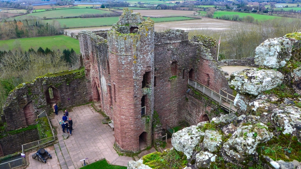 HEREFORDSHIRE, UNITED KINGDOM - Jan 24, 2020: A high angle shot of the ruins of Goodrich Castle in Herefordshire, England with fields in the background