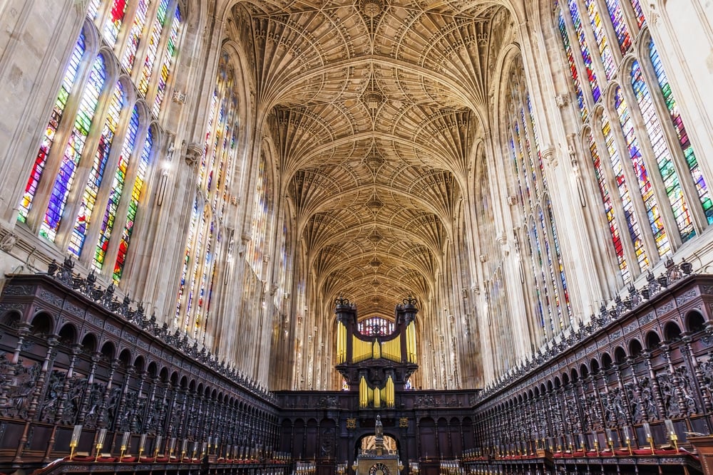 Cambridge, UK-May 22, 2023: View from chorus of interior of King's college chapel, with the pipe organ, in Cambridge University, England. With the greater fan vault and beautiful stained glass windows