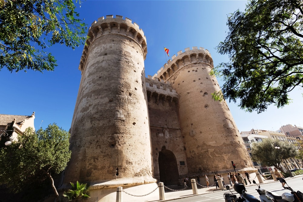 The medieval Quart Towers in Valencia Spain, Two towers flank the entrance to Valencia Old town.They have crenallated tops and are an oval shaped with a central flat area where the entrance door is