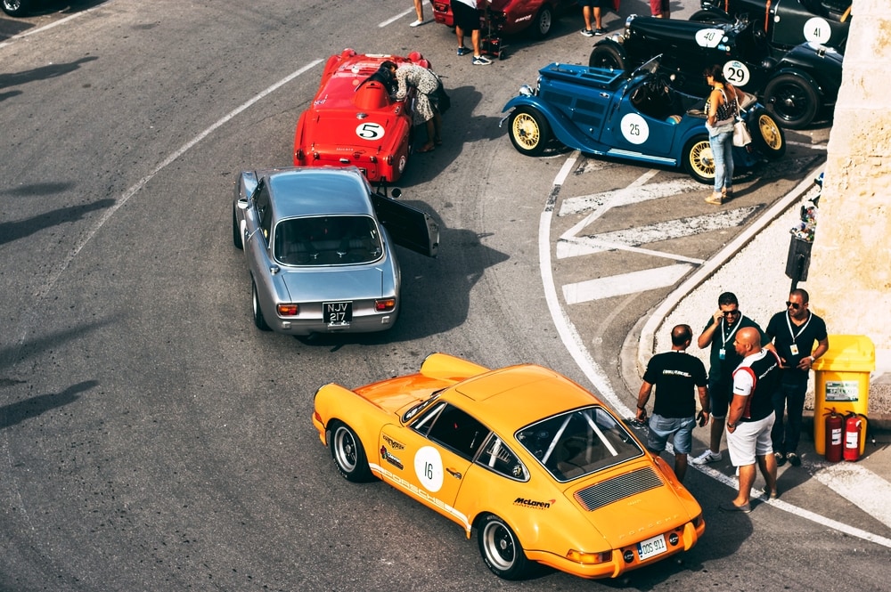 Malta Classic Grand Prix, yellow Porsche 911s, red Triumph