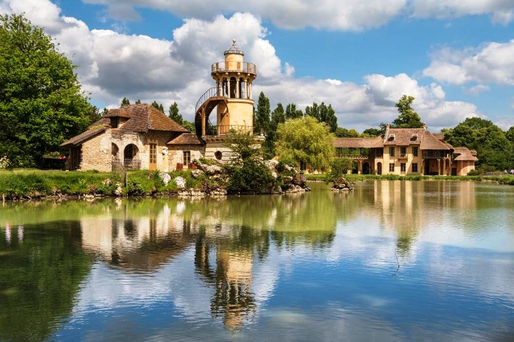Marie Antoinette was fascinated by rural life, so much so that they built her The Queen's Hamlet, a small model-like village aligned with rustic cottages, a windmill, a barn, a dairy and much more.