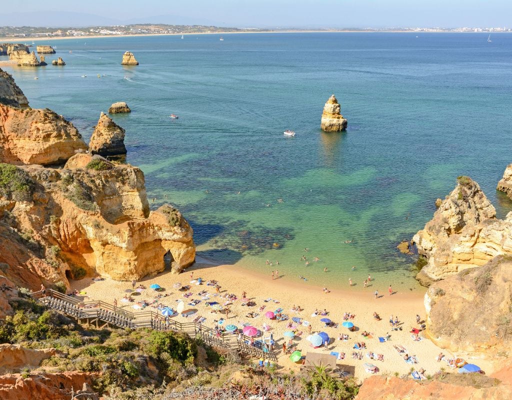 One of the best beaches in Portugal, crowded with people and rocks.