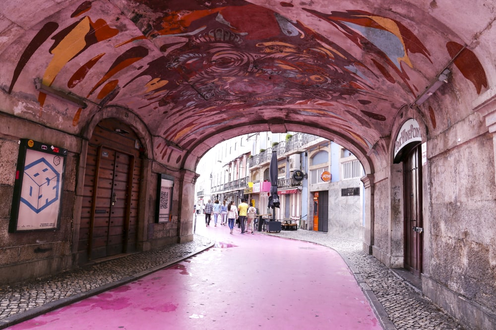 Lisbon, PortugalThe Pink street in Cais do Sodre neighborhood in Lisbon, Portugal. An archway with a pink floor.