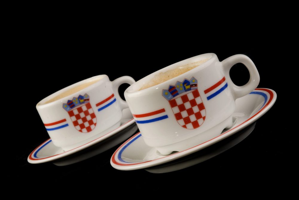 Two cups of cappuccino showcasing coffee around the world,  