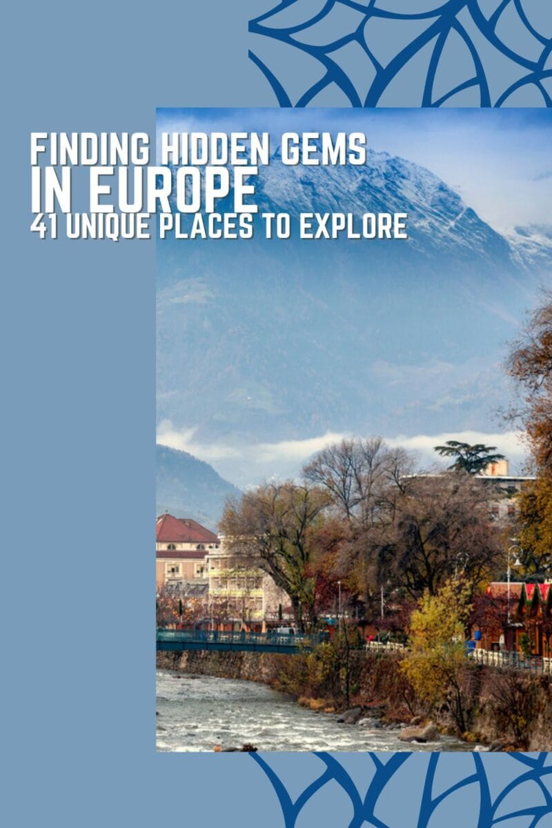 Travel guide cover showcasing a picturesque European town with a river and mountain backdrop, titled 'uncovering hidden gems in Europe: 41 unique places to explore.'