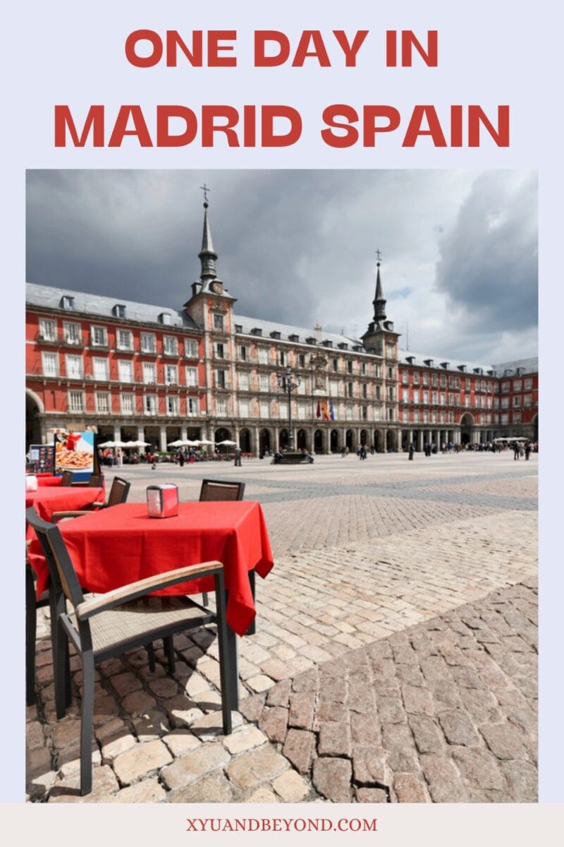Exploring the vibrant Plaza Mayor with its historical architecture on a one-day trip in Madrid, Spain.