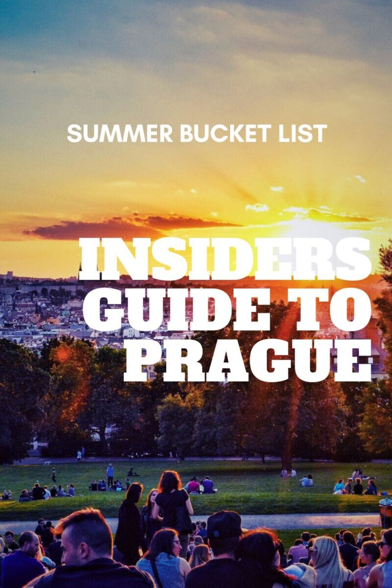 People gathered on a hill at sunset overlooking a city, with text overlay "summer bucket list: visit Prague insiders guide."
