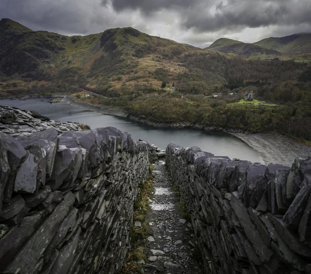 Llyn Peris and Dolbadarn Castle viewed from the slate quarries of Llanberis in North Wales UK