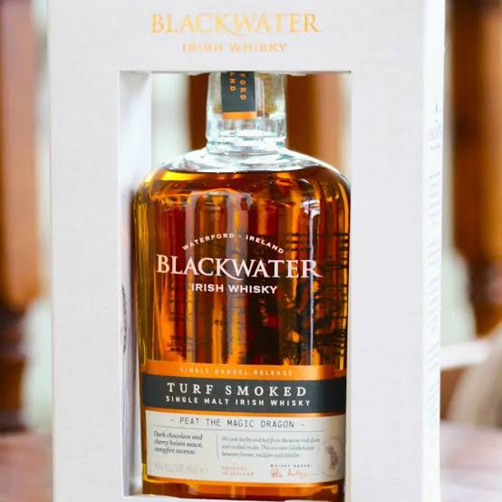 A bottle of Blackwater Irish Whisky in a white cardboard box.