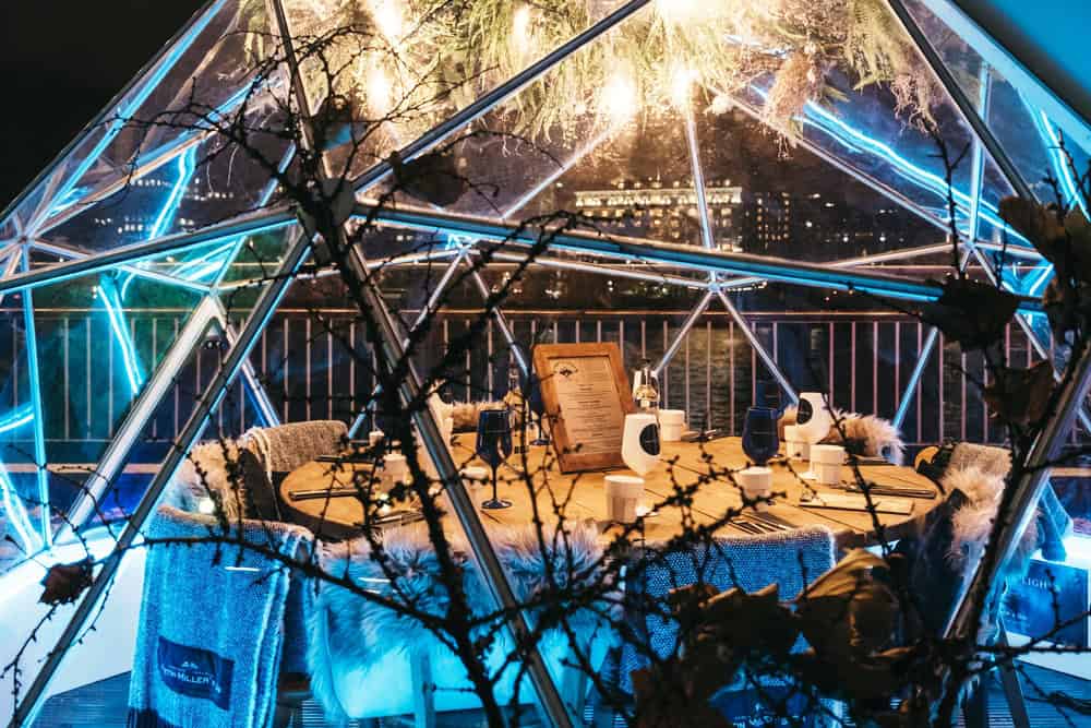 View inside Jimmys Lodge Snow Globes pop up restaurants in Southbank, London, UK.