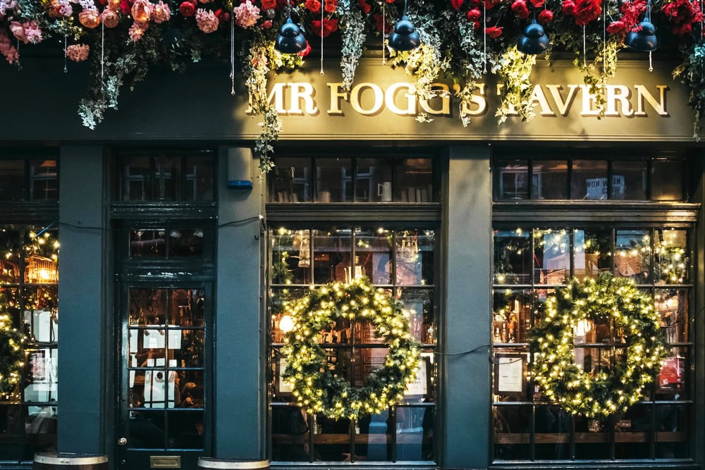 Christmas decorations on Mr. Fogg's Tavern in Covent Garden, London, UK.