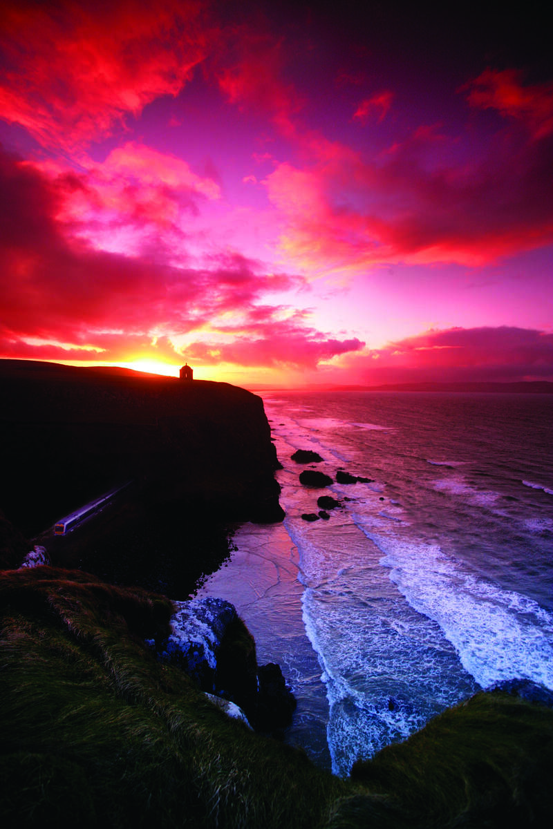 There cannot be a more wild and dramatic place in Northern Ireland than the landscape park of Downhill and Mussenden Temple . The romantic vision of Frederick Hervey, Earl of Bristol and Bishop of Derry, he created an elegant mansion at Downhill, which now lies in ruins. On the nearby clifftop the Earl Bishop built the circular Mussenden Temple as his library, modelled on the Temple of Vesta at Tivoli.
