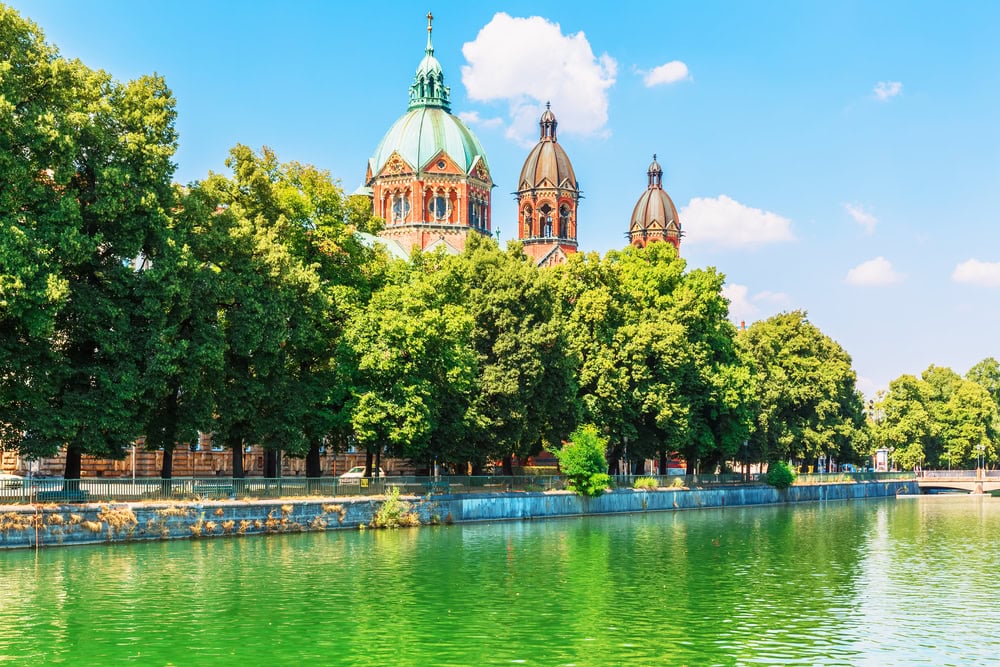 Scenic  view of Isar river embankment architecture in the Old Town of Munich, Bavaria, Germany