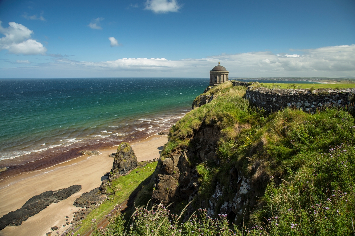 mussenden temple and beach below the cliffs