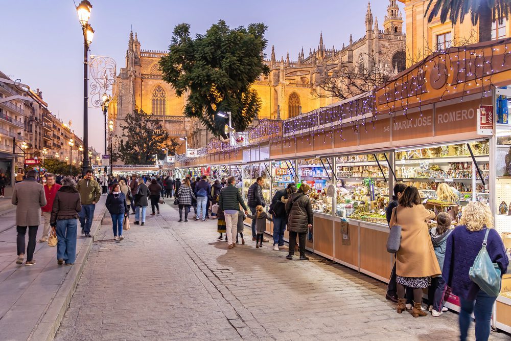 Seville's Christmas market with shoppers browsing the stalls