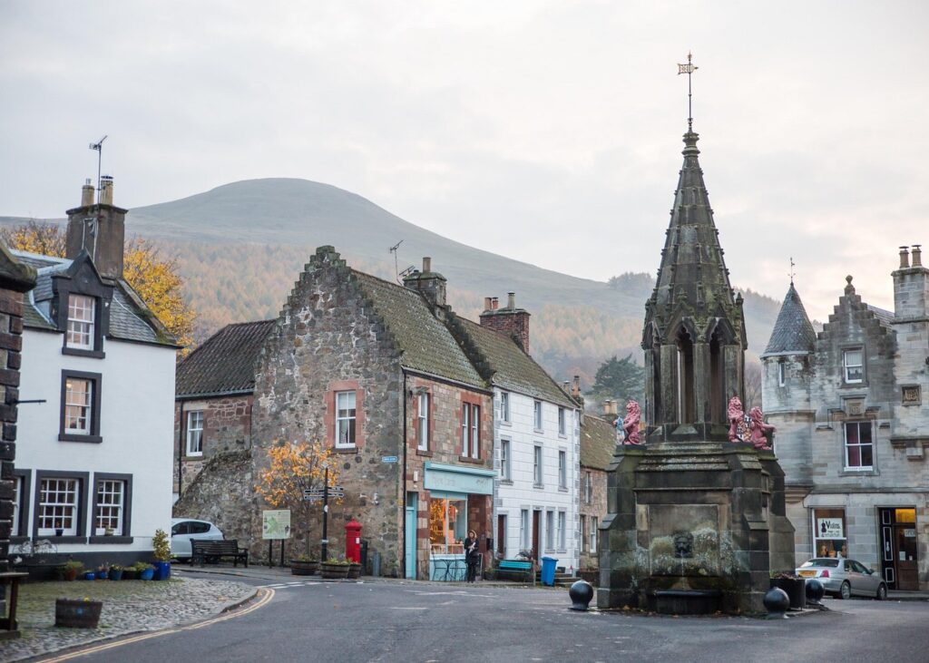 The village of Fife in Scotland with its brick houses and a central memorial